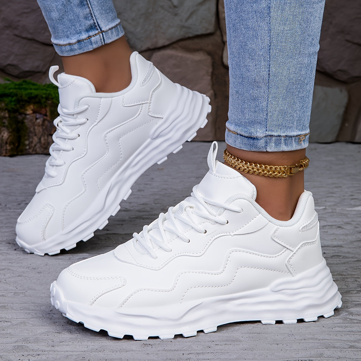 Lightweight women's fashion sneakers with non-slip sole, lace-up design, casual style, and breathable fabric lining.