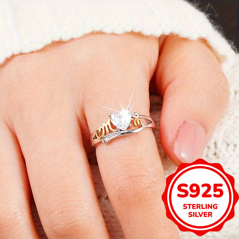 Heart-shaped zirconia ring in sterling silver with MOM lettering, featuring a 4-prong setting in a vintage sexy style. Perfect for all seasons, this ring makes a great Mother's Day gift. It also includes a synthetic gemstone representing April's