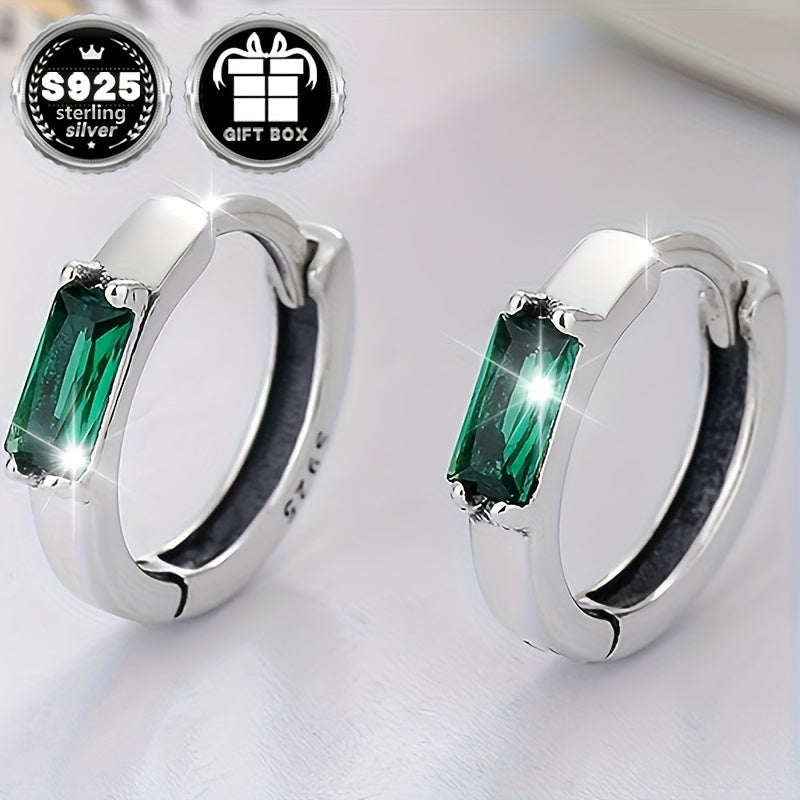 Stylish and versatile unisex earrings made of 2 pieces of sterling silver with low sensitivity. Featuring simple inlaid small square green zirconia for an elegant touch. Approximately weighing 1.9g.