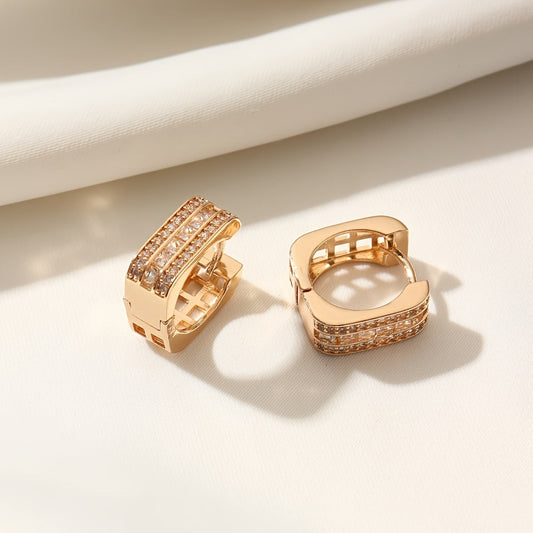 A stylish pair of MKOPSZ hoop earrings, featuring classic design and crafted with copper and synthetic zirconia. These earrings, representing the April birthstone, are perfect for both daily wear and special occasions. Inspired by a campus holiday theme