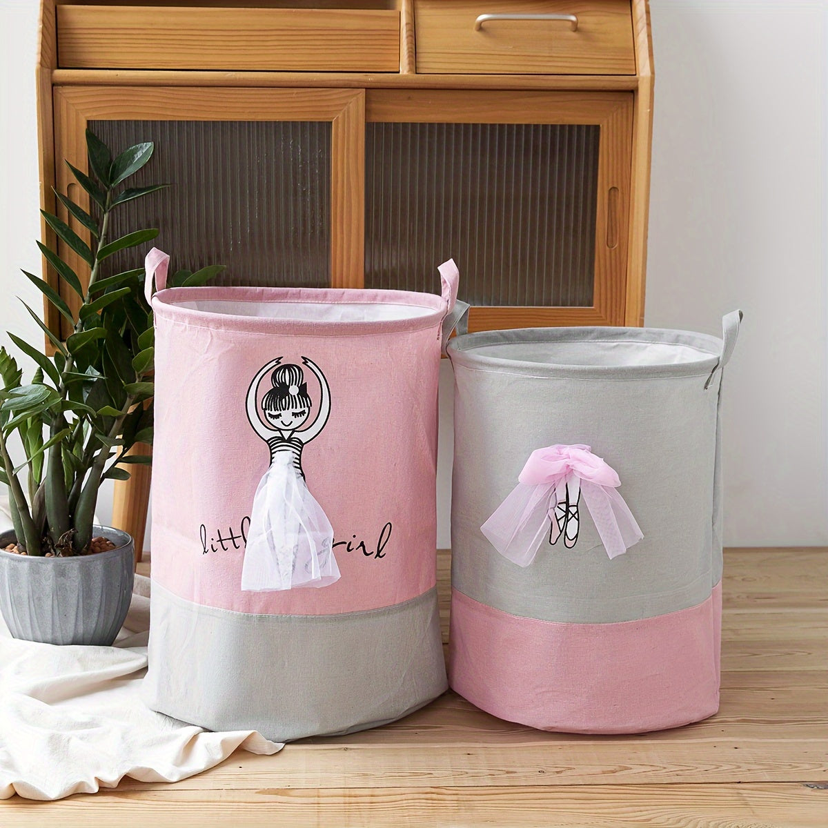 Fabric laundry hamper with handles, collapsible storage basket in casual style with dancing girl design, perfect for ages 12-14. Great for toys, books, clothes in any room.