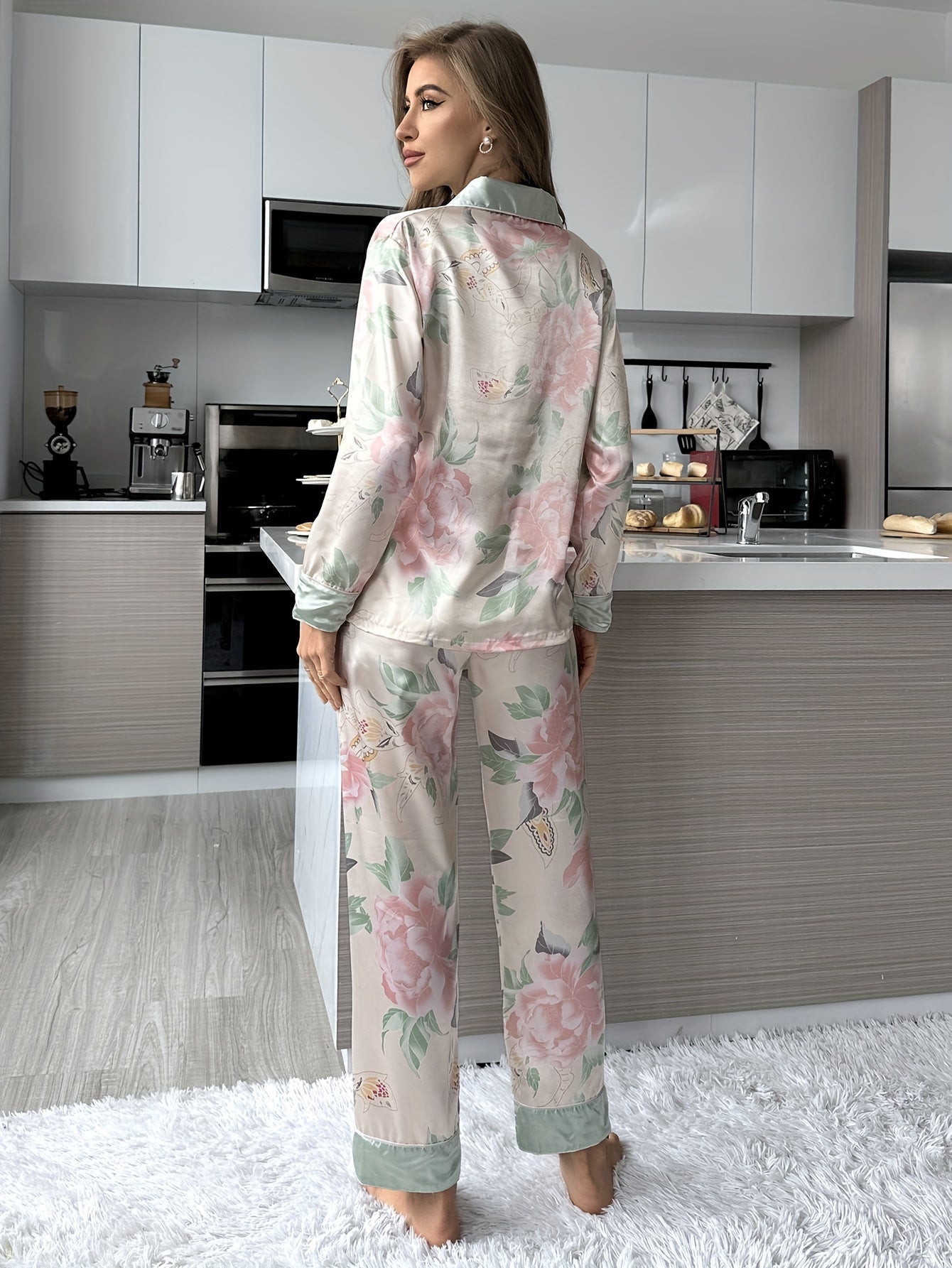 Women's soft satin pajama set with elegant floral print, long sleeve top and pants, perfect for indoor and outdoor wear.