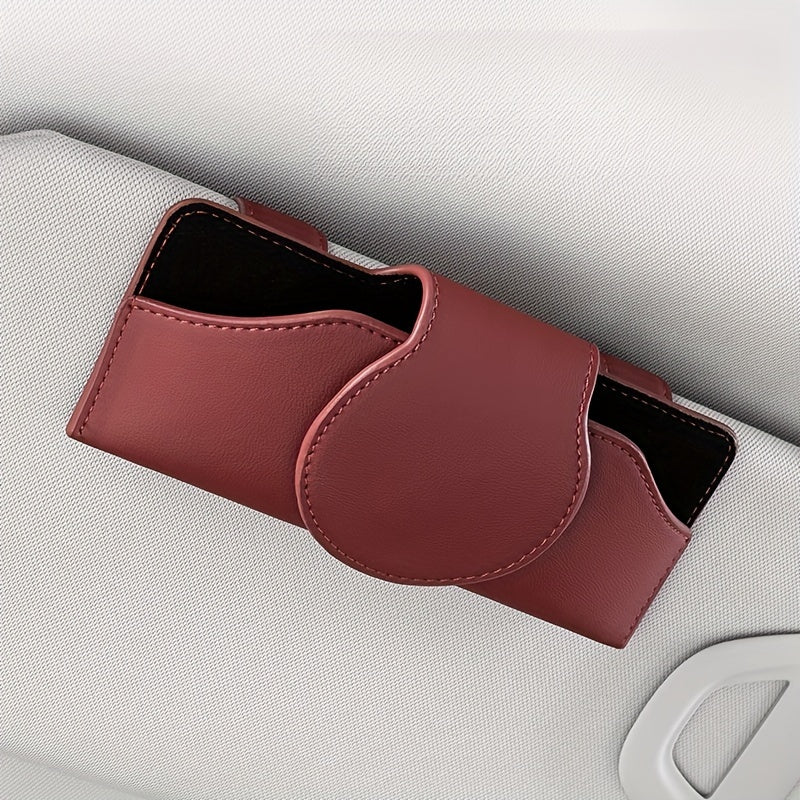 Car visor glasses holder with magnetic closure, PU leather eyeglasses storage clip, vehicle sun visor organizer with strong adsorption.