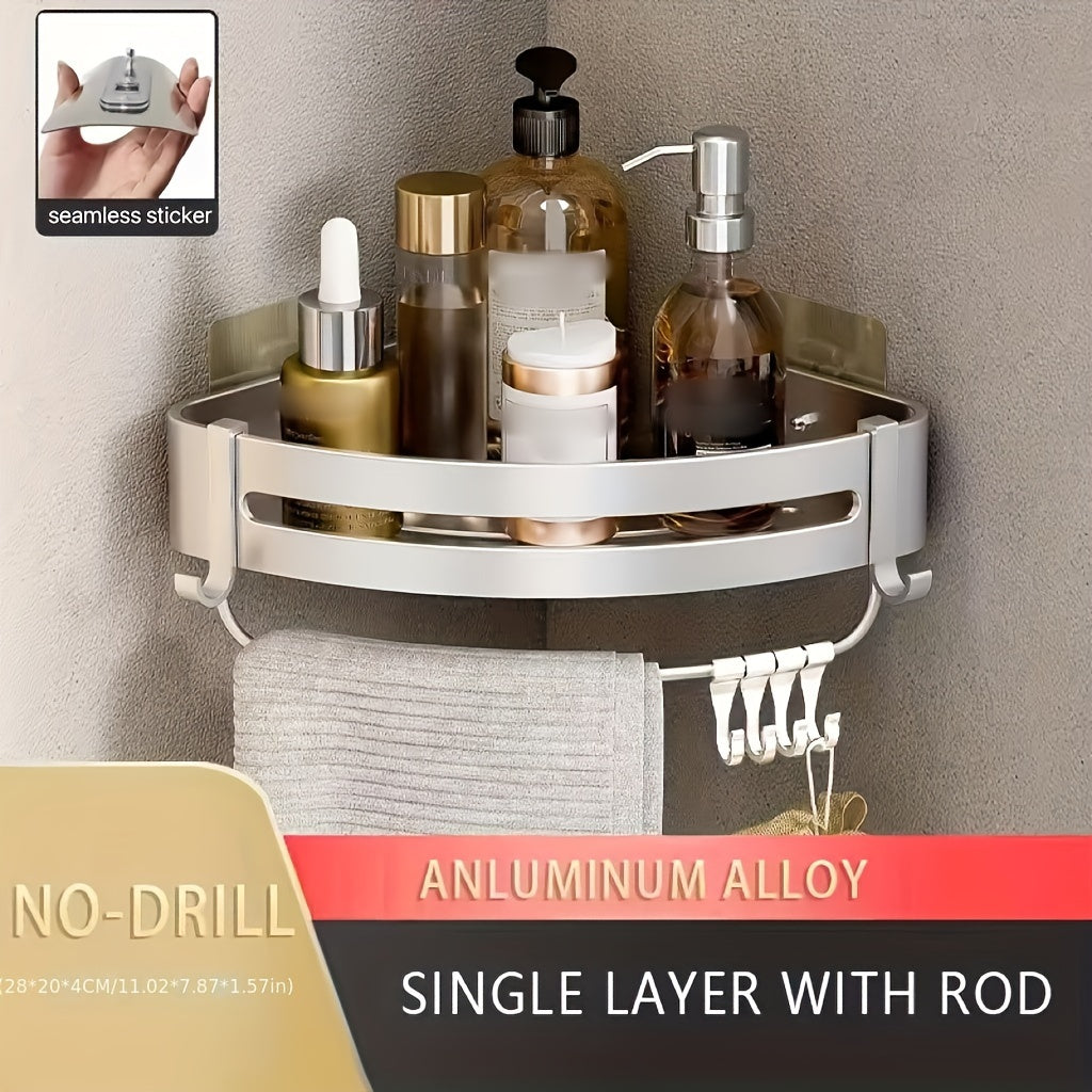 Wall-mounted bathroom storage rack for shampoo, shower gel, and cosmetics; made of space aluminum with no need for drilling.