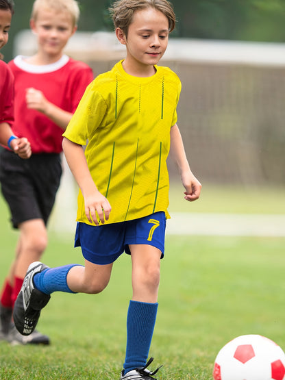 Youth soccer jersey set in vibrant yellow and blue includes shirt, shorts, and socks featuring #7. Made of durable polyester, machine washable for year-round play.