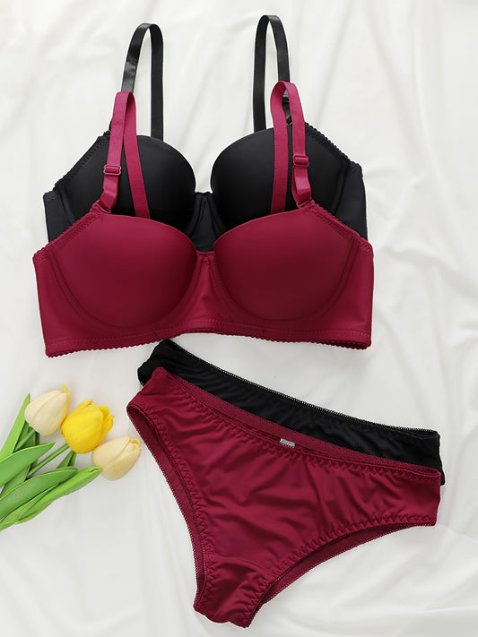 Plus size women's lingerie set includes solid color underwired bra and panty for lift and support.