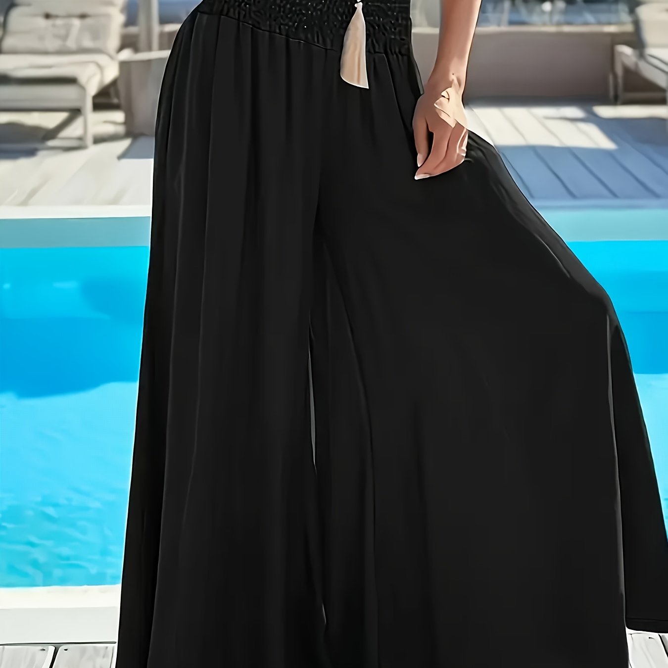 Plus size women's high-waisted wide leg pants in solid green polyester with tassel detail, perfect for comfortable casual outings.