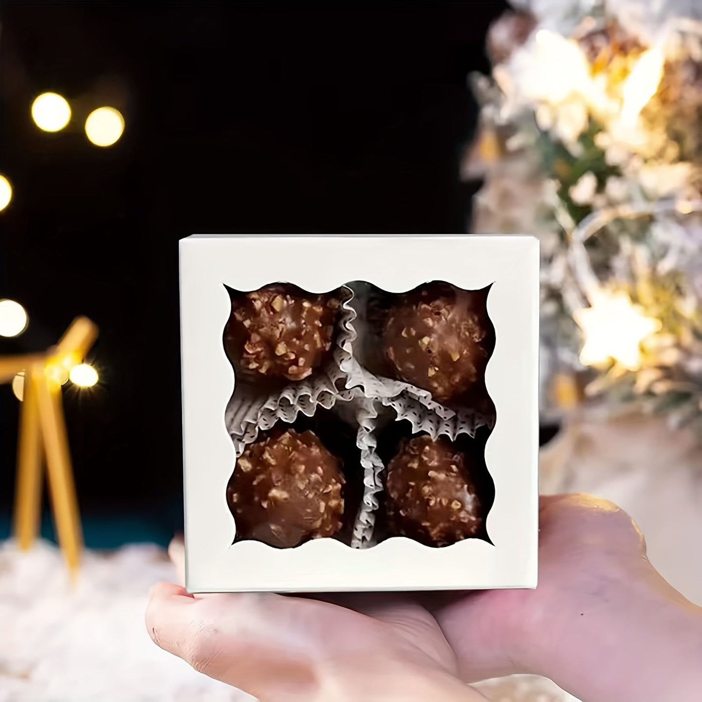 Truffle Boxes in Sets of 12, 50, or 100. Each box measures 8.13 X 8.13 X 3.81cm and is ideal for chocolates, soaps, cookies, donuts, macarons, and other baked goods. These mini bakery boxes feature a window and are perfect for gifting on Christmas