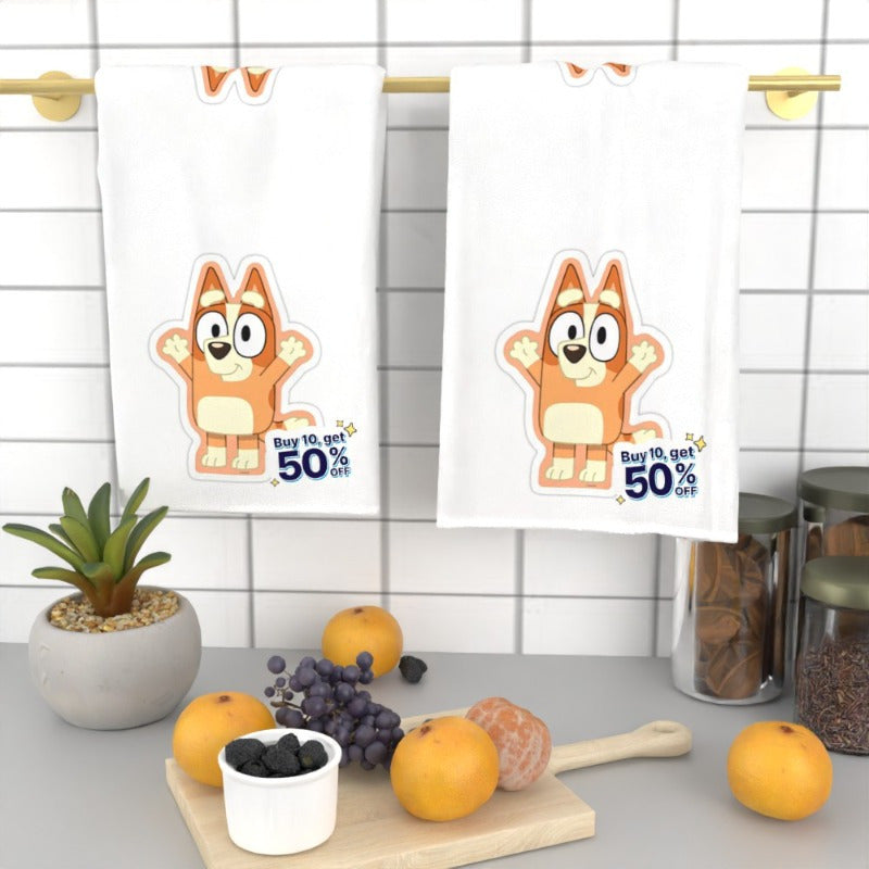 Two kitchen towels measuring 45.72X66.04 cm each, featuring whimsical cartoon designs. These adorable towels are perfect for use at home and showcase fun cartoon characters, making them ideal for cooking, dining, and everyday kitchen tasks. They also