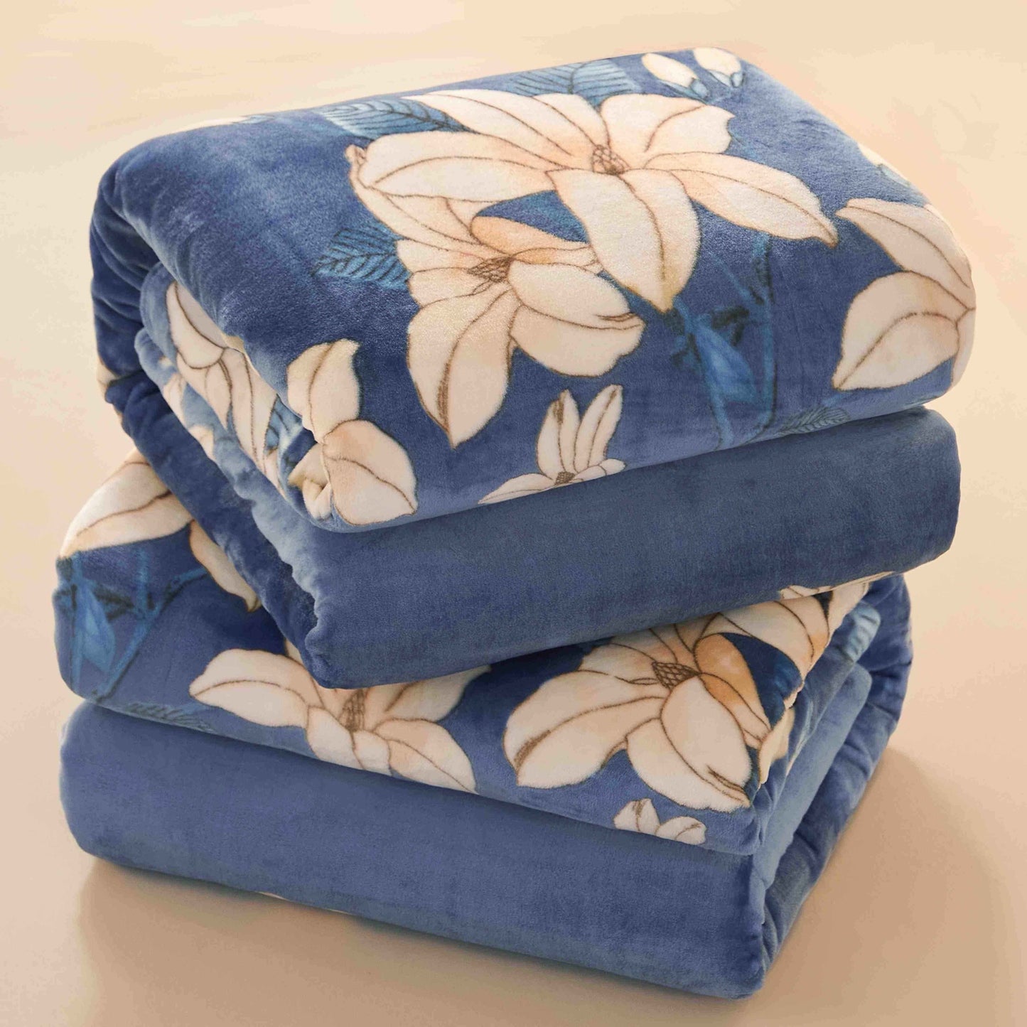 Stay cozy with this contemporary floral throw blanket, made from soft, warm plush flannel fleece. Featuring an active print design and weighing 180-200gsm, this blanket is perfect for all-season comfort. Crafted with polyester, it is suitable for use on