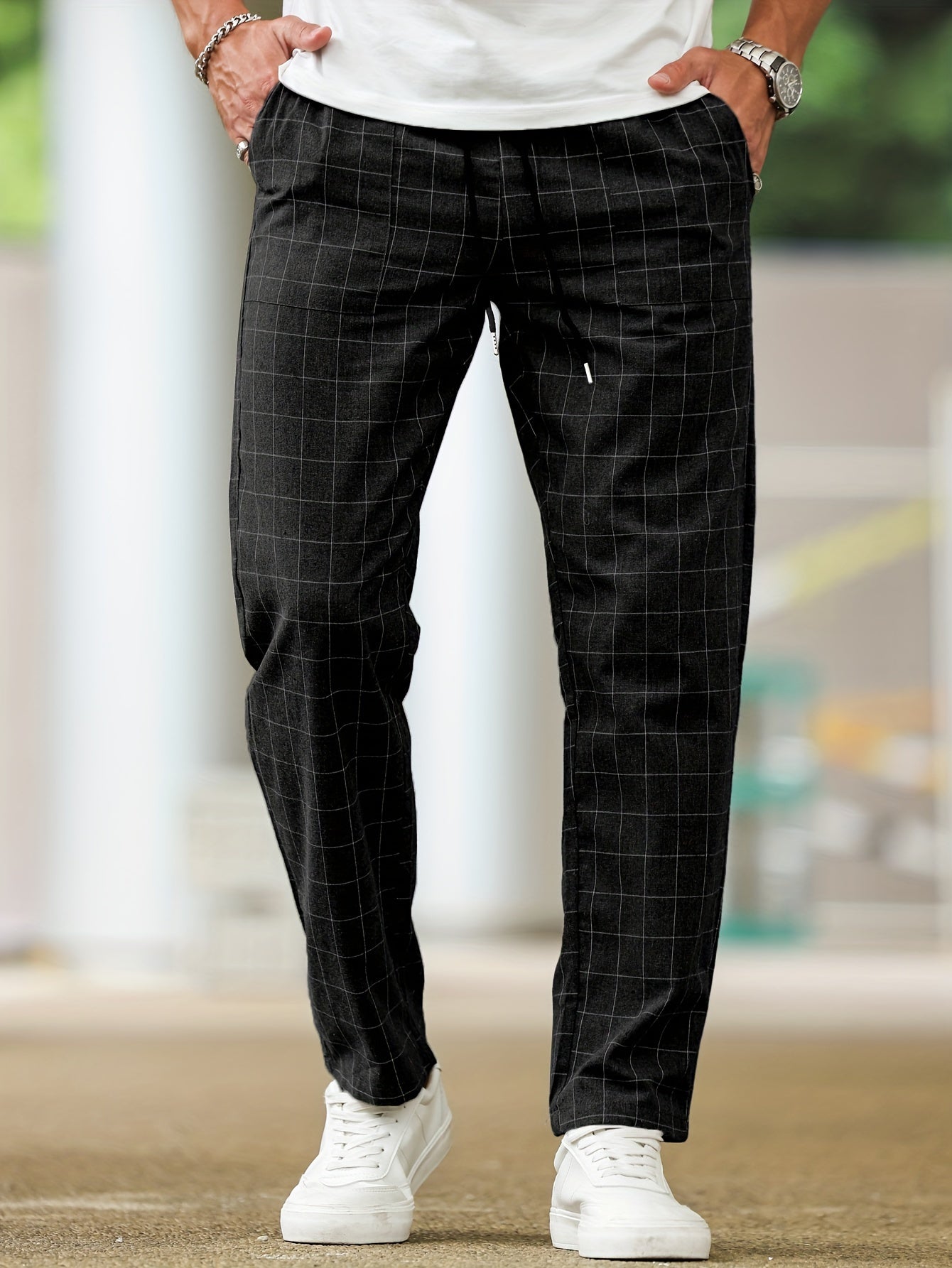 Men's polyester pants with drawstring waist, ideal for spring and fall, featuring casual striped plaid pattern.