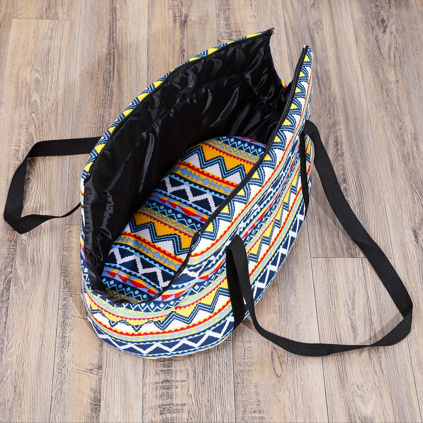 Washable, portable cat carrier bag in multi-colored design, perfect for small to medium cats. Features zippered closure and disassembled for easy litter outings.