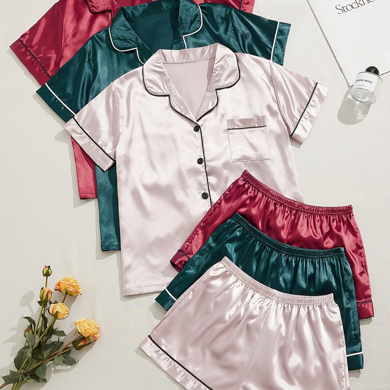 Women's two-piece pajama set in multicolor variety of short-sleeved shorts and solid color imitation satin.