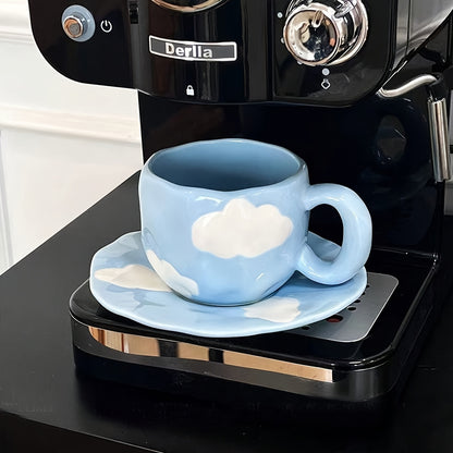 Cloud-shaped ceramic coffee mug with saucer - reusable, handwash only, ideal for breakfast & office use - great gift idea.