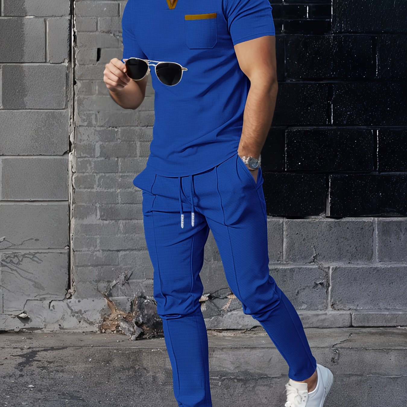 High end trendy men's casual set with waffle collar short sleeve top and long pants in a solid color