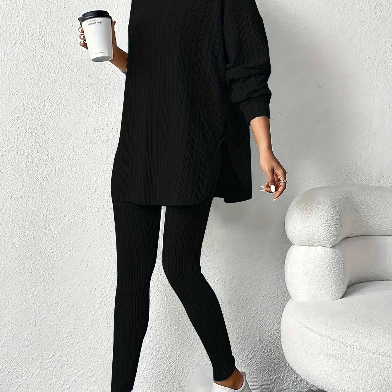 Women's cozy ribbed fleece lounge set featuring a long sleeve hoodie and stretchy leggings ideal for casual home wear in the fall/winter. Made of a comfortable polyester blend with a