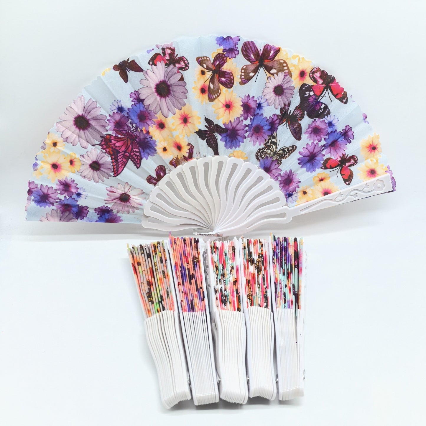 Get your hands on 6 or 12 elegant folding fans featuring a delicate butterfly and floral design. Made from quality linen material, these handheld cooling fans are perfect for photoshoots and staying comfortable during the summer without the need for