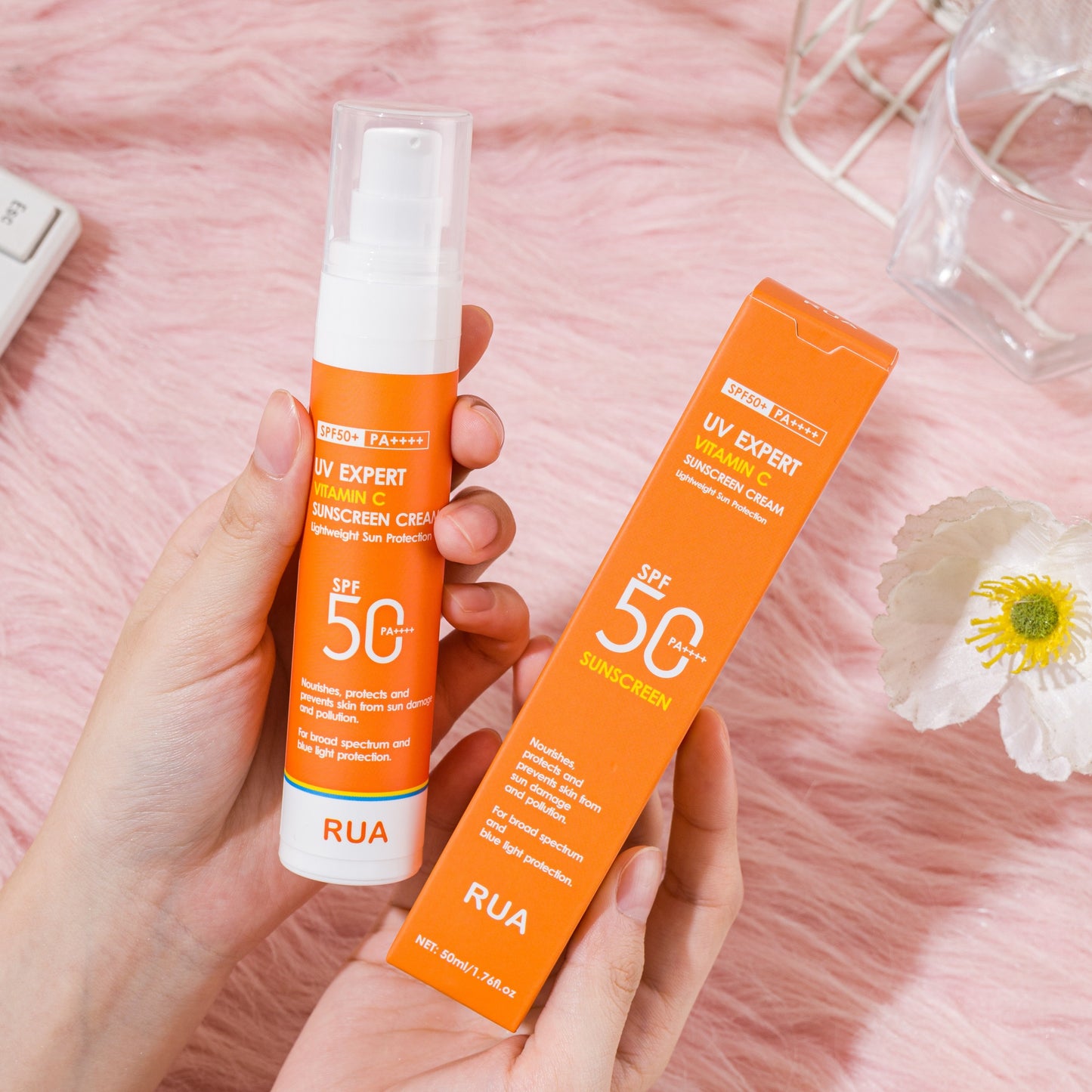 Non-greasy Vitamin C sunscreen for face and body, ideal for outdoor activities on sunny days.