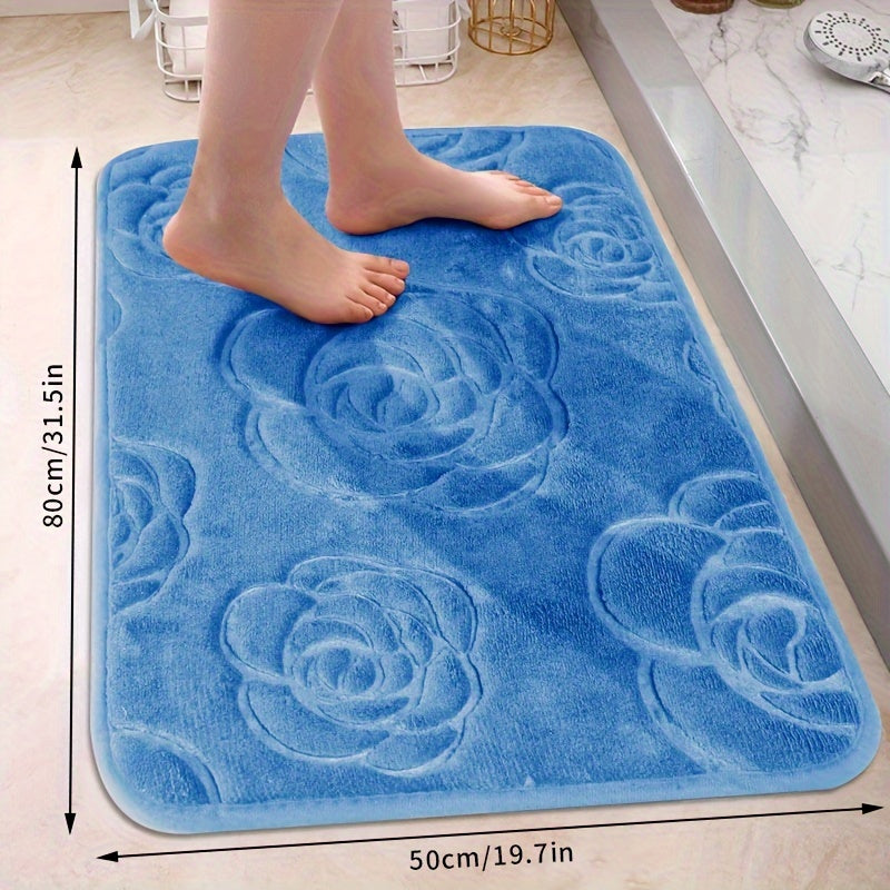 Soft and luxurious bath mat featuring a beautiful rose embossed design. This non-slip bathroom rug is made of ultra-soft knit polyester, providing superior comfort and absorbency. Lightweight and washable, this versatile mat is perfect for use in the