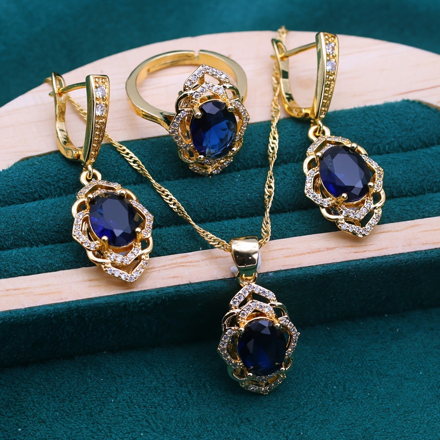 Vintage vacation style jewelry set in 18K gold plated design featuring a beautiful blue gemstone. This set includes a copper mosaic necklace, earrings, ring, and pendant, making it perfect for women to wear at parties, as gifts, or during Christmas. This