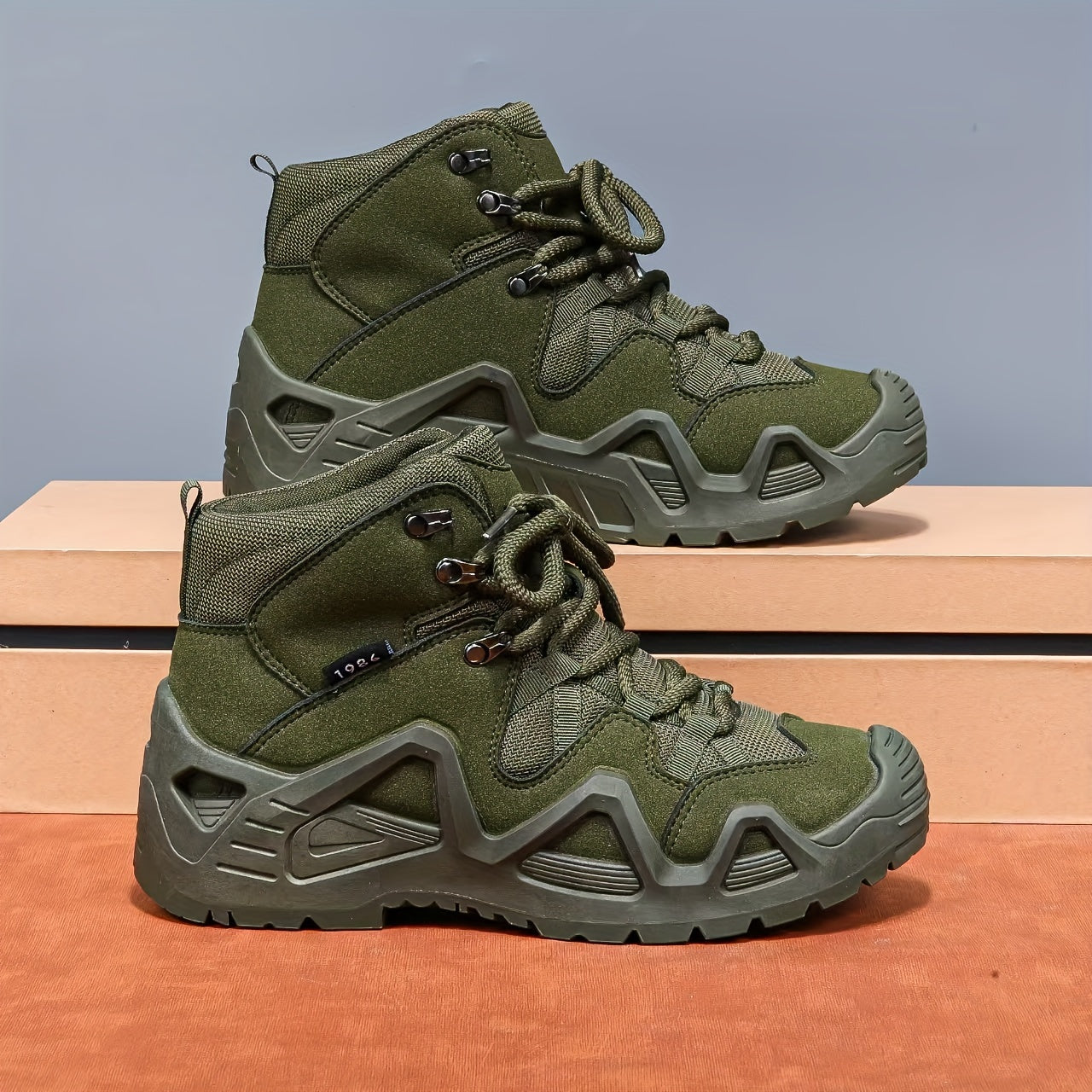 Men's durable, breathable, vintage-inspired hiking boots with a rugged sole in green high-top design for all-season outdoor adventures.