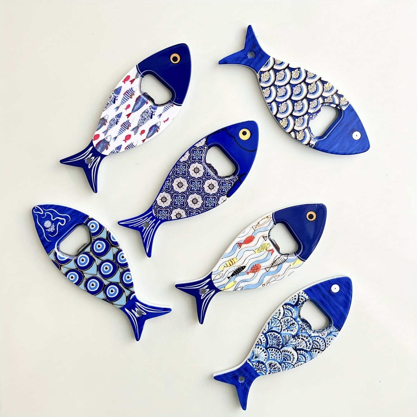 Fish-shaped cap opener with magnet for refrigerator decoration, no power required.