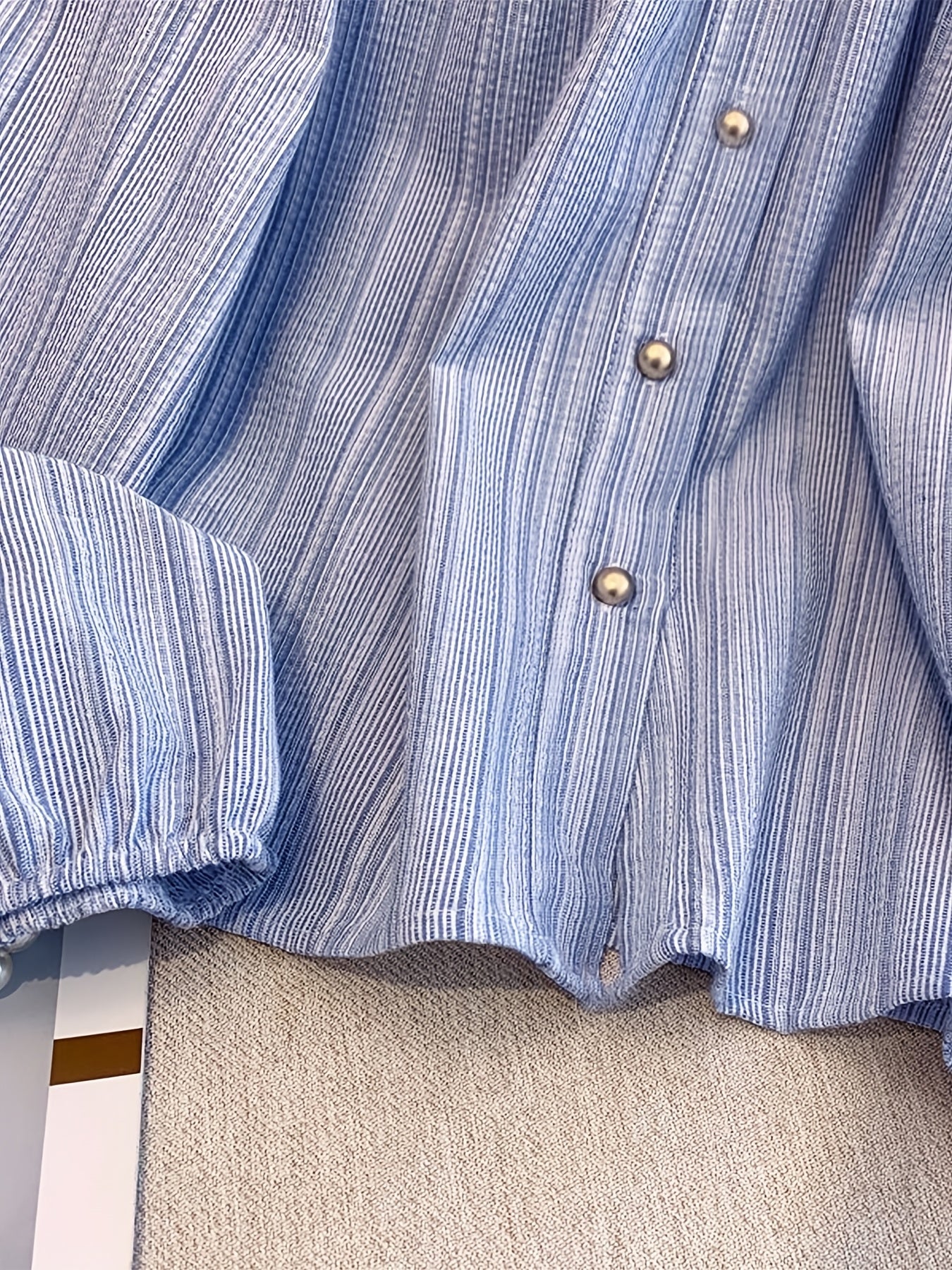 Vintage Striped Long Sleeve Blouse for Women in Light Blue with Ruffled Cuff and Button-Up Half Placket. Made from Polyester with a Flowing Fit, Perfect for Spring/Fall. Japanese-inspired