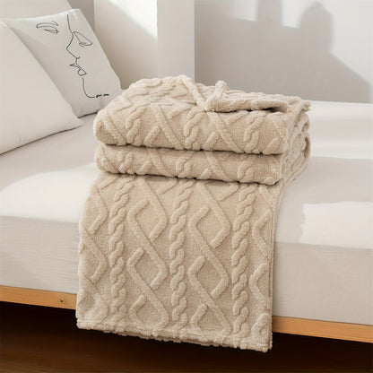 A cozy and versatile blanket with a sweater-like embossed design, perfect for New Year's, Chinese New Year, Valentine's Day, Mother's Day, and back-to-school occasions.