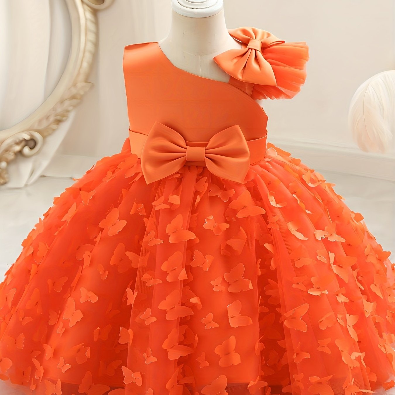 Toddler girls princess dress with butterfly design, bow belt, and flutter mesh sleeves, perfect for parties and birthdays.