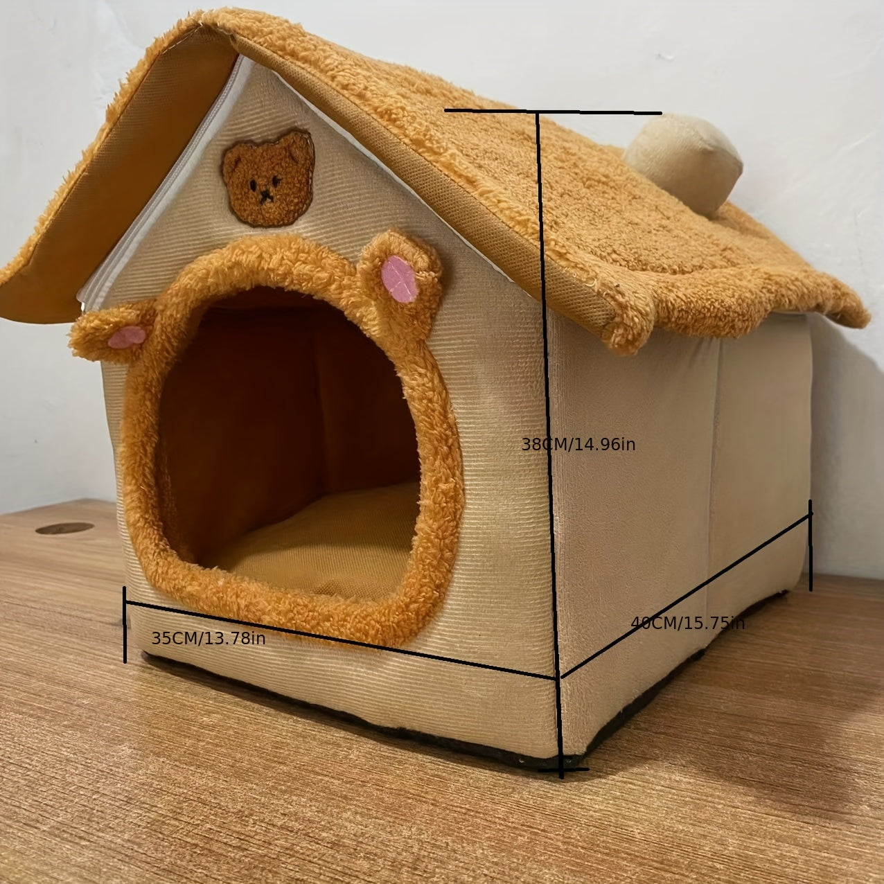 Foldable pet bed for cats and dogs, washable and comfortable for warmth.