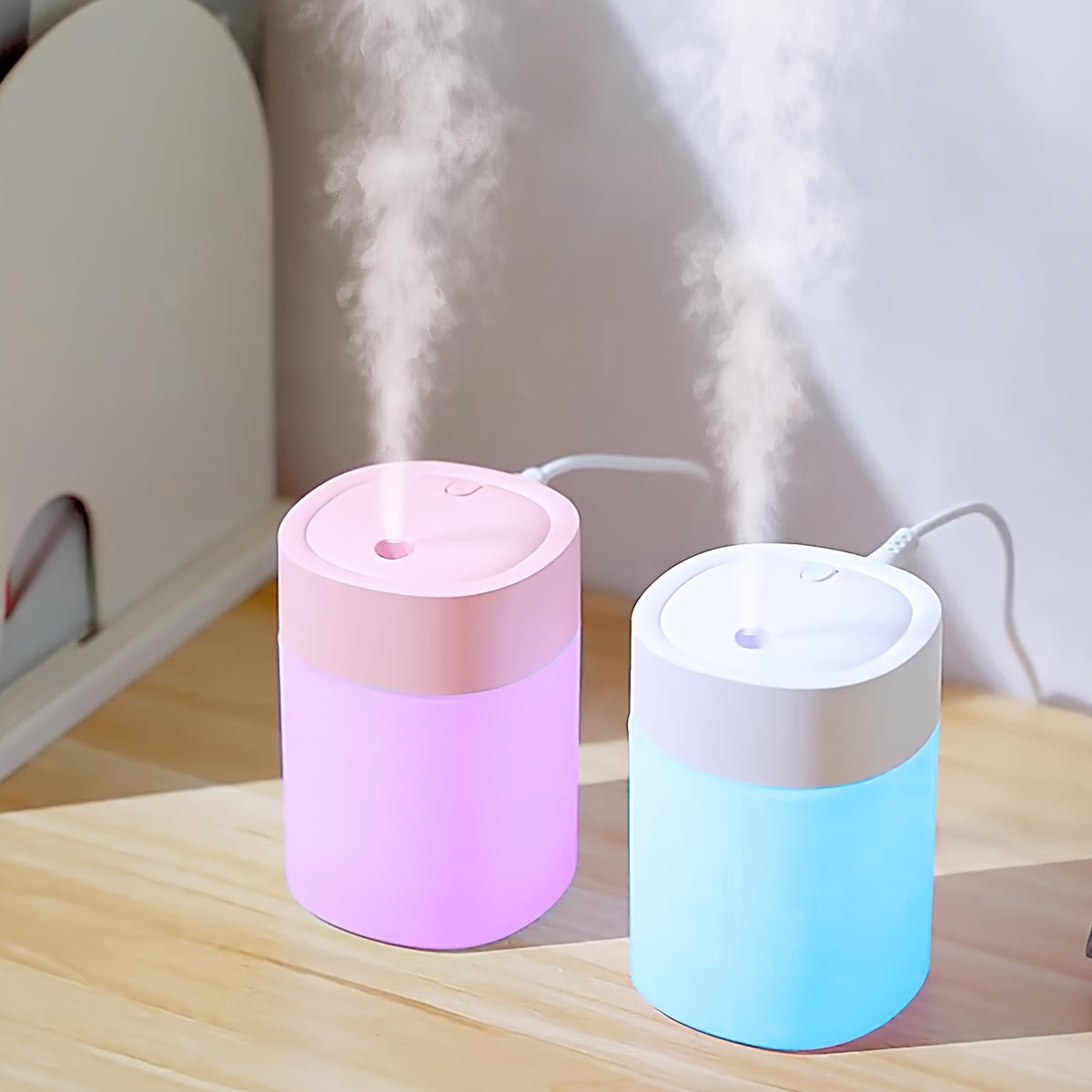 USB-powered portable aromatherapy humidifier with color-changing night light for office, bedroom, and car.