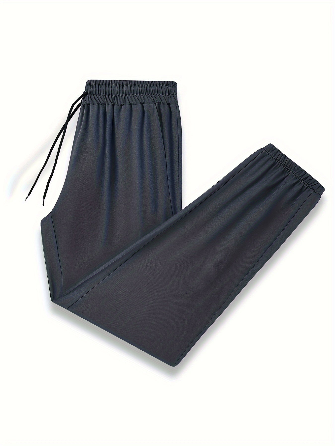 Men's drawstring trousers with pockets for outdoor activities in spring and summer.