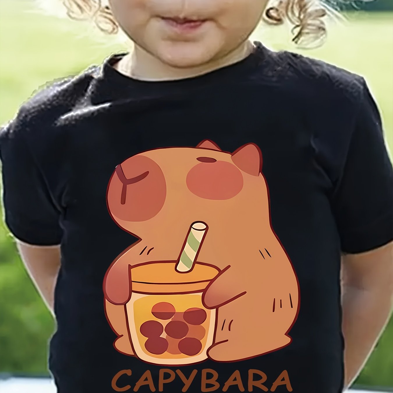 Girls' cozy round neck t-shirt with capybara drinking milk tea pattern, perfect for spring and summer.