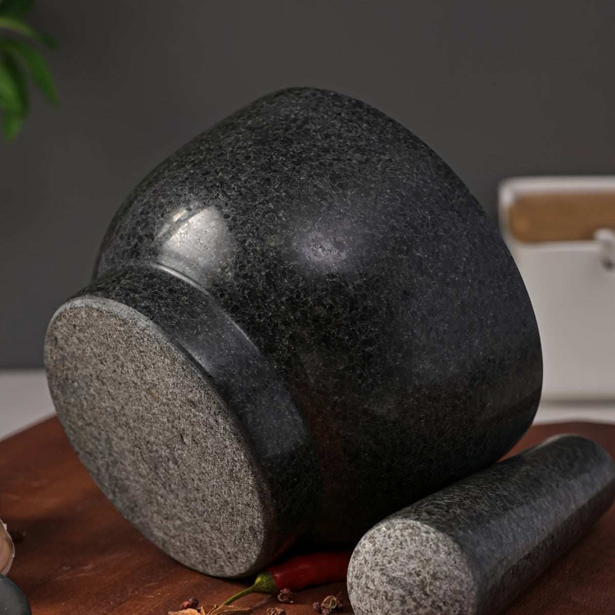 One piece of natural stone bowl designed for use in kitchens. This polished molcajete is perfect for grinding garlic, spices, and herbs. It can also be used as a traditional garlic crusher, grain and seed mill.