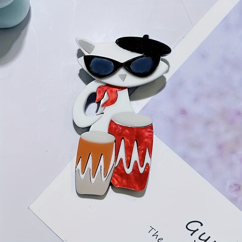 Elegant Cartoon Cat Drummer Brooch Pin, featuring an Acrylic Irregular Shape. This trendy Animal Musician Badge is the perfect Clothing Accessory, suitable for both Men and Women. Elevate your style with this Unisex Fashion Lapel Pin.