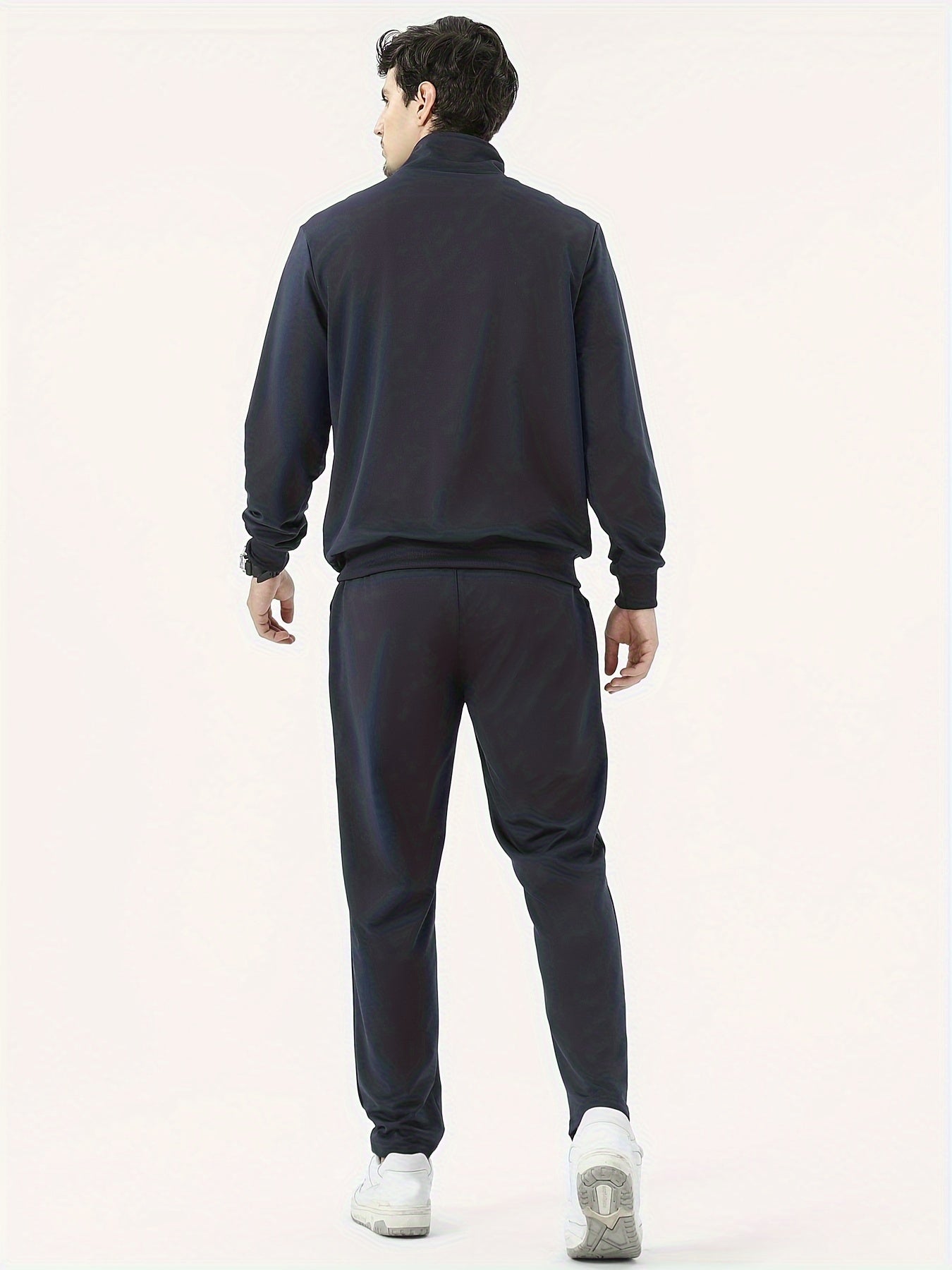 Men's 2-piece outfit with stand collar jacket and drawstring sweatpants for casual wear in spring and autumn.