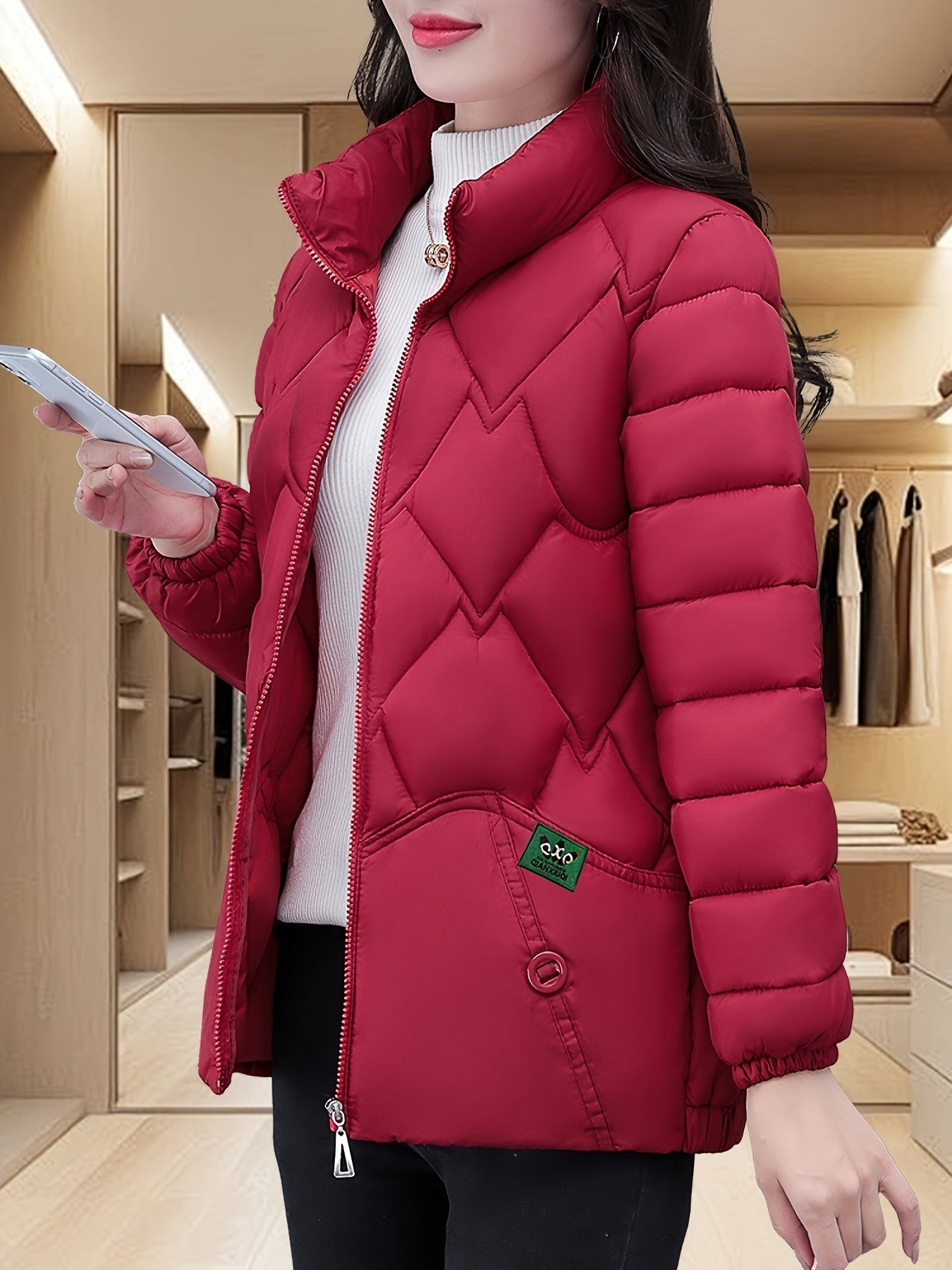 Embroidered quilted jacket for middle-aged moms with pleated hem and thick insulation for warmth.