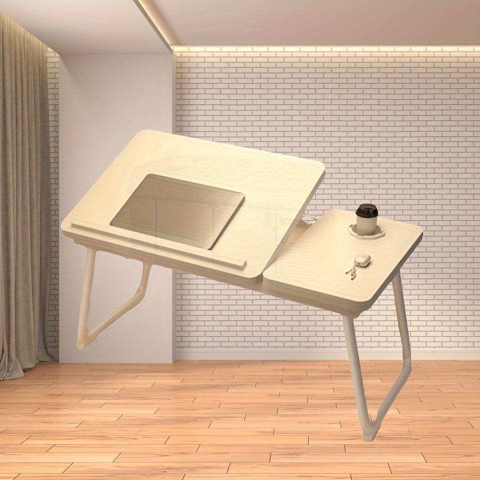 Folding laptop desk with adjustable height settings, in white/black, suitable for home, dorm, or office use. Ideal for studying or working in bed.