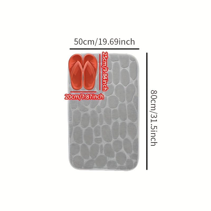 Soft, non-slip cobblestone bath rug absorbs water quickly for various indoor uses.