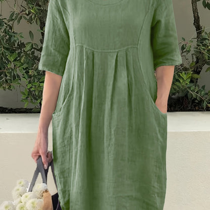 Solid color crew neck dress for spring/fall casual wear.