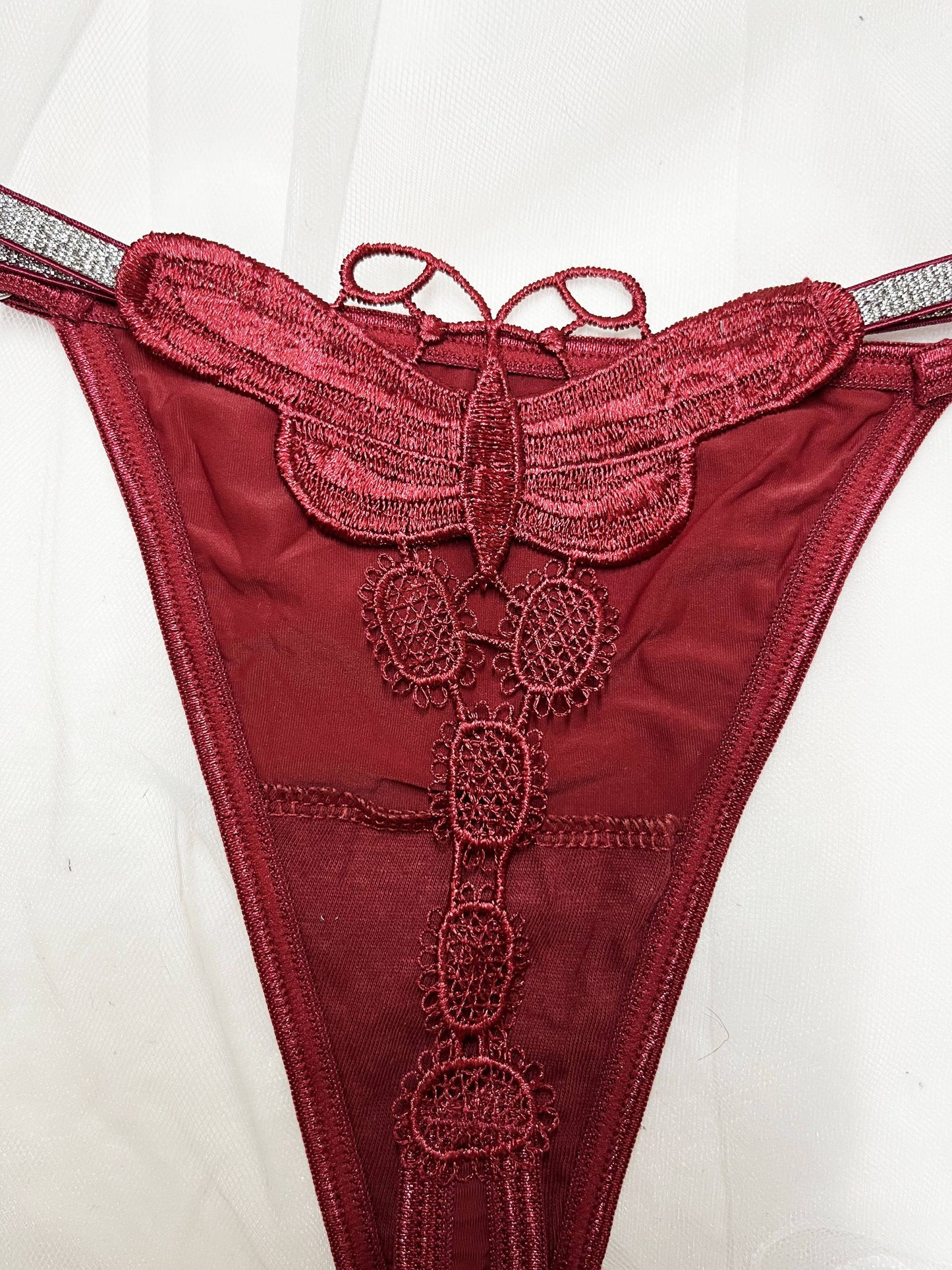 Glittery butterfly embroidered thong pants in two colors with a thin belt