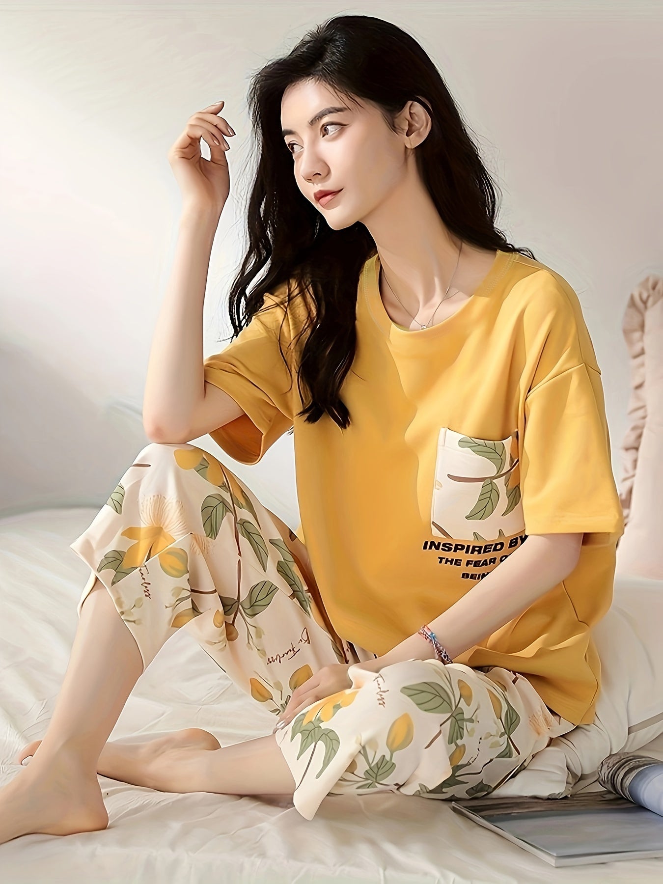 Floral print casual loungewear set for women: short sleeve tee and capri pants for a cozy, relaxed fit at home in summer.