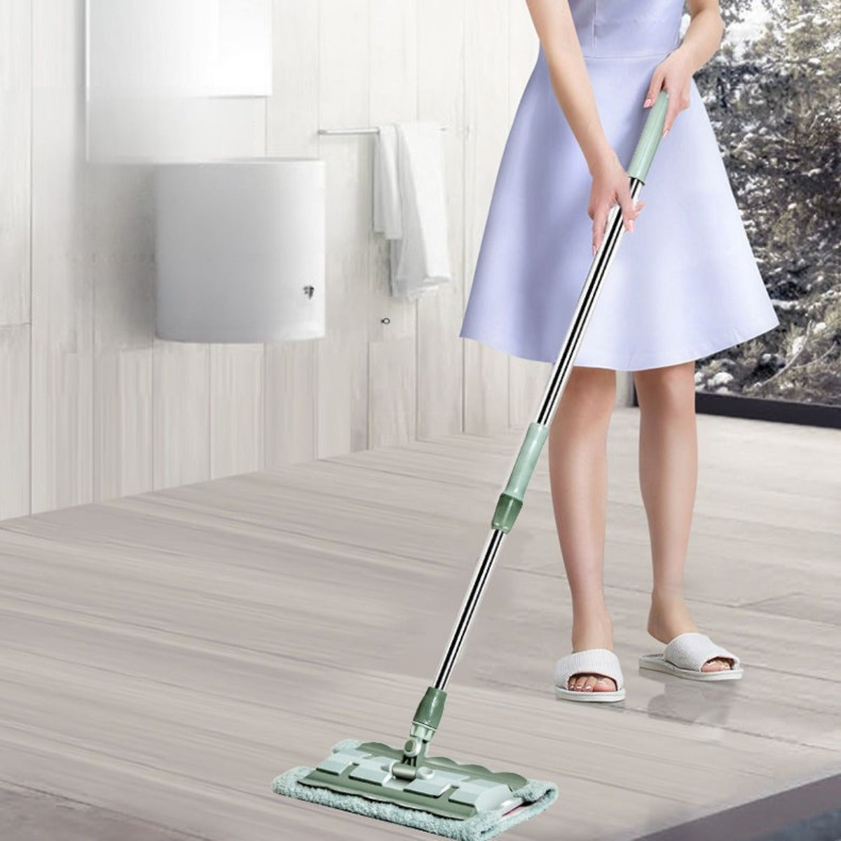 Adjustable handle makes this versatile microfiber flat mop ideal for cleaning hardwood, tile, and glass surfaces, whether wet or dry.