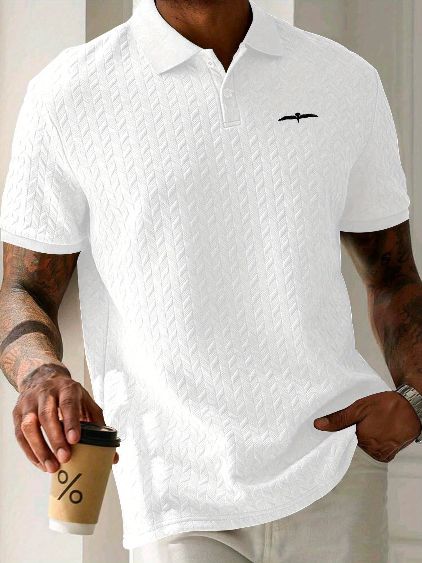 Men's polo shirt with eagle print, short sleeves, and slight stretch. Ideal for summer sports and leisure.