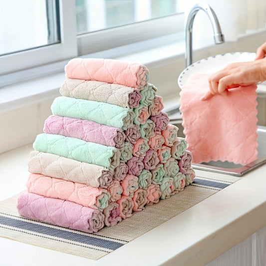 Package of 18 modern microfiber cleaning cloths designed with a knit fabric weave for extra softness. These oblong-shaped cloths are versatile and can be used as dish towels, kitchen wipes, and non-shedding scouring pads. Suitable for various areas