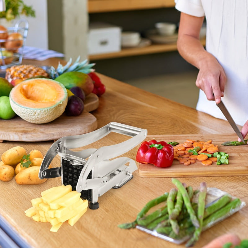 No electricity needed for this multifunctional stainless steel French fry cutter and manual potato dicer with 2 blades. This cast iron kitchen utensil is perfect for cutting vegetables and fruits.