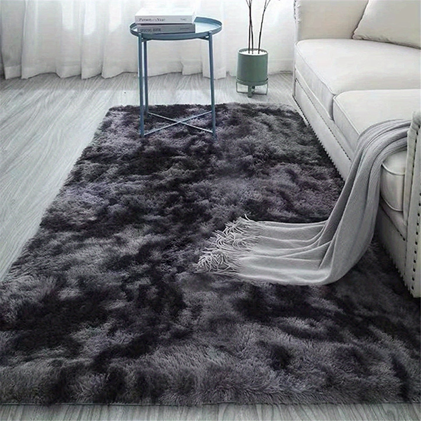 Soft and fluffy gray gradient tie-dye printed carpet rug to enhance the décor of your living room, study, bedside, or bedroom.