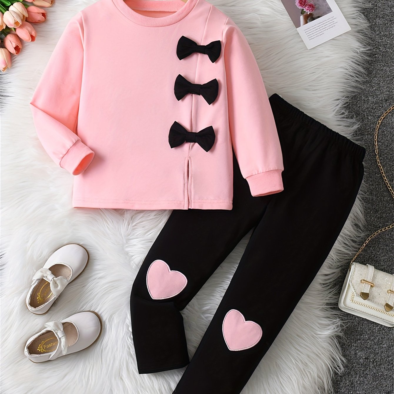 Girls' sweatshirt with bow decoration, long sleeves, and matching pants with love embroidery, ideal for outdoor activities.