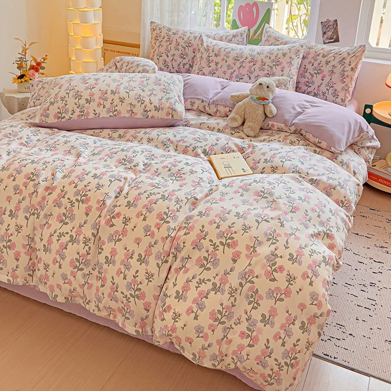 Soft floral print bedding set includes duvet cover and 2 pillowcases, made of breathable polyester with zip closure. Suitable for all seasons, perfect for bedrooms and guest rooms.