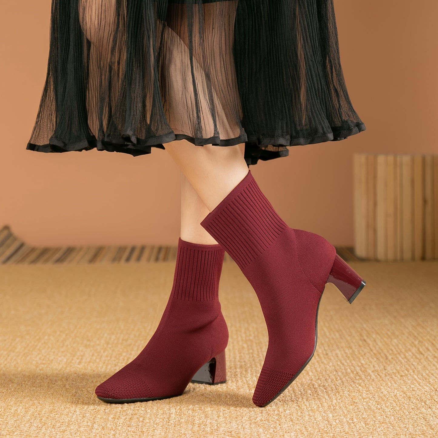 Women's square toe sock boots with high heel, solid color knit design, stretchy slip on style.